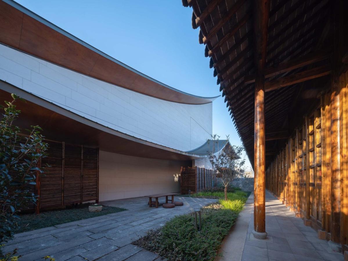 16_謇里小鎮展覽館_北側雙層屋檐，與老建筑的兩層屋檐分別呼應_?此間建筑攝影_(1).jpg